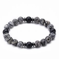 Close-up of 8mm grey marble beads and black lava stones with silver metal spacers - Map Stone and Frosted Stone