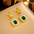 Detail of elegant gold earrings featuring emerald-green square zircon and tiny diamonds - Earrings