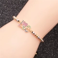 Detail of beaded LOVE bracelet with multi-color cubic zirconia on a female wrist - Color Zirconia LOVE 12