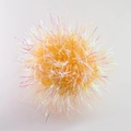 Macro shot of 6cm orange crinkle ball cat toy with iridescent tinsel and laser texture - Golden Yellow + Iridescent