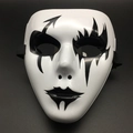 Detail view of a white Halloween mask with black hand-painted artistic patterns and straps - Single Arrow Style