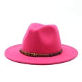 Detail of rose red wool felt fedora featuring brown leather band with gold metal beads - Rose Red