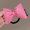 Detalle de lazo para el pelo de cuero sintético rosa con etiqueta tejida decorativa - Coletero / Rosa (D-4347-1)