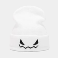 Detailed view of white knit beanie with black devil embroidery and ribbed texture - M (56-58cm) / White