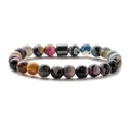 Detailed close-up of 8mm natural stone beads and magnetic hematite cylinder on mens bracelet - Colored Agate