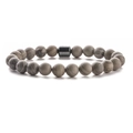 Detailed view of 8mm natural grey stone beads and hematite cylinder bead bracelet - Grey Wood Grain