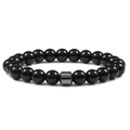 Handmade beaded bracelet with polished black round beads and a grey hematite cylinder bead - Polished Black Agate Style