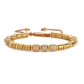 Adjustable gold bead bracelet with micro-paved zircon accents and brown woven cord - Golden Hematite