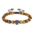 Macro view of leopard head charm with micro-pave zircons and tiger eye stone beads - Brown Tiger Eye Bracelet (Leopard Head)