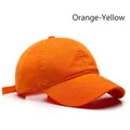 Adjustable orange washed cotton baseball cap with curved brim for sun protection - Adjustable / Orange