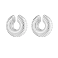 Detail of silver-tone hollow ear clips with unique spiral ribbed texture and C-shape design - Silver
