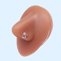 Detail of star and crescent nose stud with white zircons on a realistic model - Silver Moon Star White Zirconia (#29)