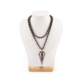Black beaded necklace with large gold geometric triangle pendant on a white mannequin - Medium / White Brushed Leather: Medium