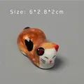 Macro detail of hand-painted calico ceramic cat chopstick rest sized 6x2.8x2cm - 6*2.8*2cm / Style B