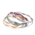 Twisted wave bangles in silver, gold, rose gold, and rainbow finishes for women - Iridescent Wave Style (KB66645-LO) / 9 Pieces Set