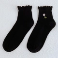 Chaussettes noires en coton pour femmes avec broderie florale et bordure ondulée douce - Noir