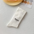 White cotton crew socks with vertical knit texture and minimalist paper packaging label - One Size / Cream