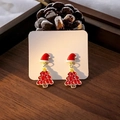 Detail of Christmas tree and Santa hat earrings on a rustic wood background with pinecones - E5947-7 Christmas Hat Tree