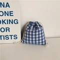 Close-up of blue and white gingham cotton linen drawstring pouch with thick cotton cord - 14x16cm / Blue Plaid Small