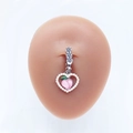 Detail of heart-shaped belly ring with pearls, pink peach charm on model - Pearl Pink Peach