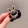 Elastic black scrunchie featuring a cute cartoon bunny charm with white accent ears - Black Rabbit Cartoon Scrunchie 1Pc