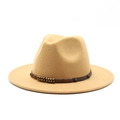 Detail of camel wool fedora hat featuring a brown leather band with retro metal rivets - Camel
