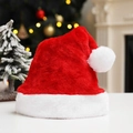Soft plush red Christmas hat with white pompom on top for festive holiday celebration - Red