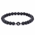 6mm natural lava stone bead bracelet featuring a black letter V charm with silver spacers - Letter V