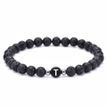 Natural lava stone beaded bracelet featuring white letter T charm and silver spacers - Letter T