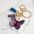 Portachiavi con farfalla colorata e nappe, dimensioni 6,0x8,8 cm e peso di 12,8 g - Portachiavi a Farfalla