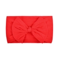 Soft red nylon baby headband with a large oversized bow on a clean white background - Bright Red (020)