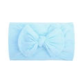 Detailed view of light blue soft nylon baby headband with a large folded bow decoration - Bright Blue (006)