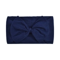 Detail view of a soft navy blue nylon baby headband featuring a large fabric bow - Dark Blue