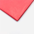 Detail of red laser sequin floral tissue paper showing its glossy texture and folded edges - Pure Red