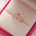 Macro detail of rose gold flower ring set with pink stones in a gift box - 11#14121A (Rose Gold Pink Floral Set)