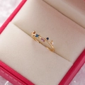 Close-up of gold flower ring with colorful zirconia stones on a velvet jewelry box - 15#14123A (Champagne Gold Multi-Gem Branch)