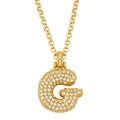 Close-up of golden letter G pendant necklace with white zircons on a rolo chain - Letter G
