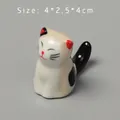 Macro shot of 4x2.5x4cm lucky cat ceramic chopstick rest with hand-painted details - 4*2.5*4cm / Style C