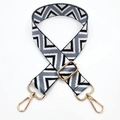 Close-up of adjustable woven shoulder strap with black and white geometric V-patterns - Light Gray White Triangle