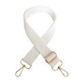 Close-up of white herringbone woven bag strap with adjustable gold hardware buckles - Silver Clasp / White