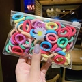 Colorful high-elastic hair ties for girls in a transparent PVC bag with a daisy print - Light Macaron Colors (100 Pcs)