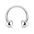 Macro detail of silver horseshoe piercing with heart-shaped ends and polished finish - Silver Heart