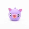 Purple cartoon pig squeeze toy with a cute tongue-out expression and hanging hole - Small Purple Pig