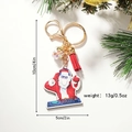 Portachiavi creativo Babbo Natale DJ con sfera di stelle e nappina rossa decorativa - Babbo Natale DJ