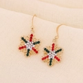 Detailed view of Christmas snowflake drop earrings with red and green rhinestones - Red Green Snowflake