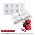 Detailed view of 8-cavity heart silicone mold with finished red mousse cakes - 8-Cavity Heart