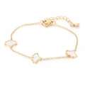 Gold plated heart bracelet with white mother of pearl charms on a clean white background - Gold