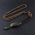 Ethnic style necklace with brown wooden beads and a striped rectangular pendant - Natural Shape Wood Bead Chain