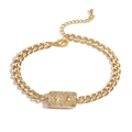 Golden Cuban chain bracelet featuring a sun and lightning pendant with pavé zircon borders - Sun and Lightning Style