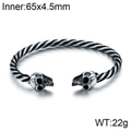 Retro stainless steel twisted cable bracelet featuring detailed skull heads with 65mm inner diameter - Skull Head Style (KB96853-BD)